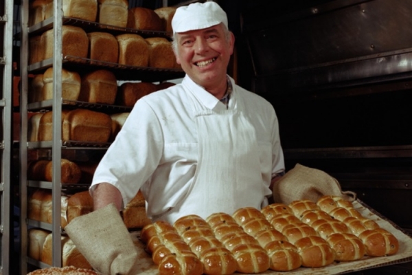 Baker with hot cross buns