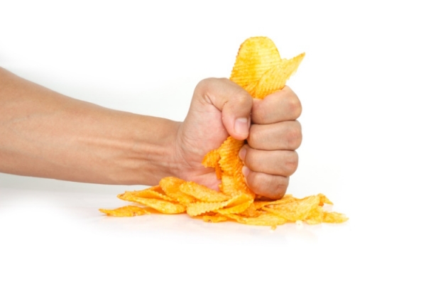 Fist bashing potato chips Getty angintaravichian