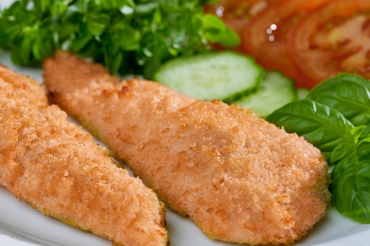 JBT claims the system can coat chicken, vegetables and fish fillets with reduced oil