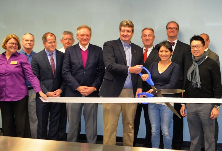 Avure CEO Jeff Williams cuts the ribbon to officially open the company's new headquarters / R&D lab / customer service center in Erlanger, Kentucky.