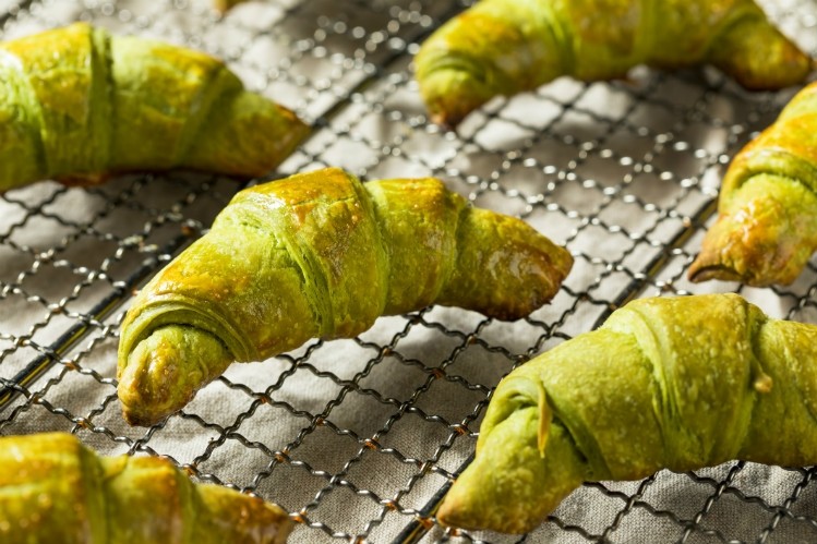 Color and texture can add intrigue to baked goods, as seen through the rise of matcha used here in croissants. Pic: Getty Images/bhofack2