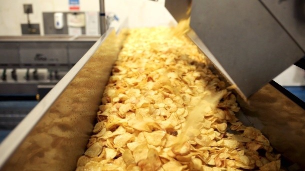 Burts Chips has installed a high-speed potato frying line at its Devon facility to cope with growing demand. Pic: Burts