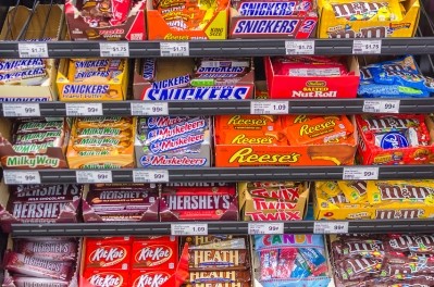 Quri encourages confectionery and salty snack companies to move products out of the home aisle as both categories see display declines. ©iStock/Ben Harding