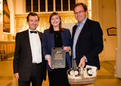 Agnes Gabriel-Damaz receives her award from Stephen Hallam and Scott Goodfellow. Pic: Gradz Bakery