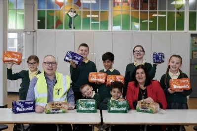 Lee Pendlebury, driver operations manager at Warburtons, delivers products to Deborah Docherty, head teacher at Church Road Primary School, and her pupils.   