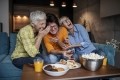 Snacking with friends, older women Getty